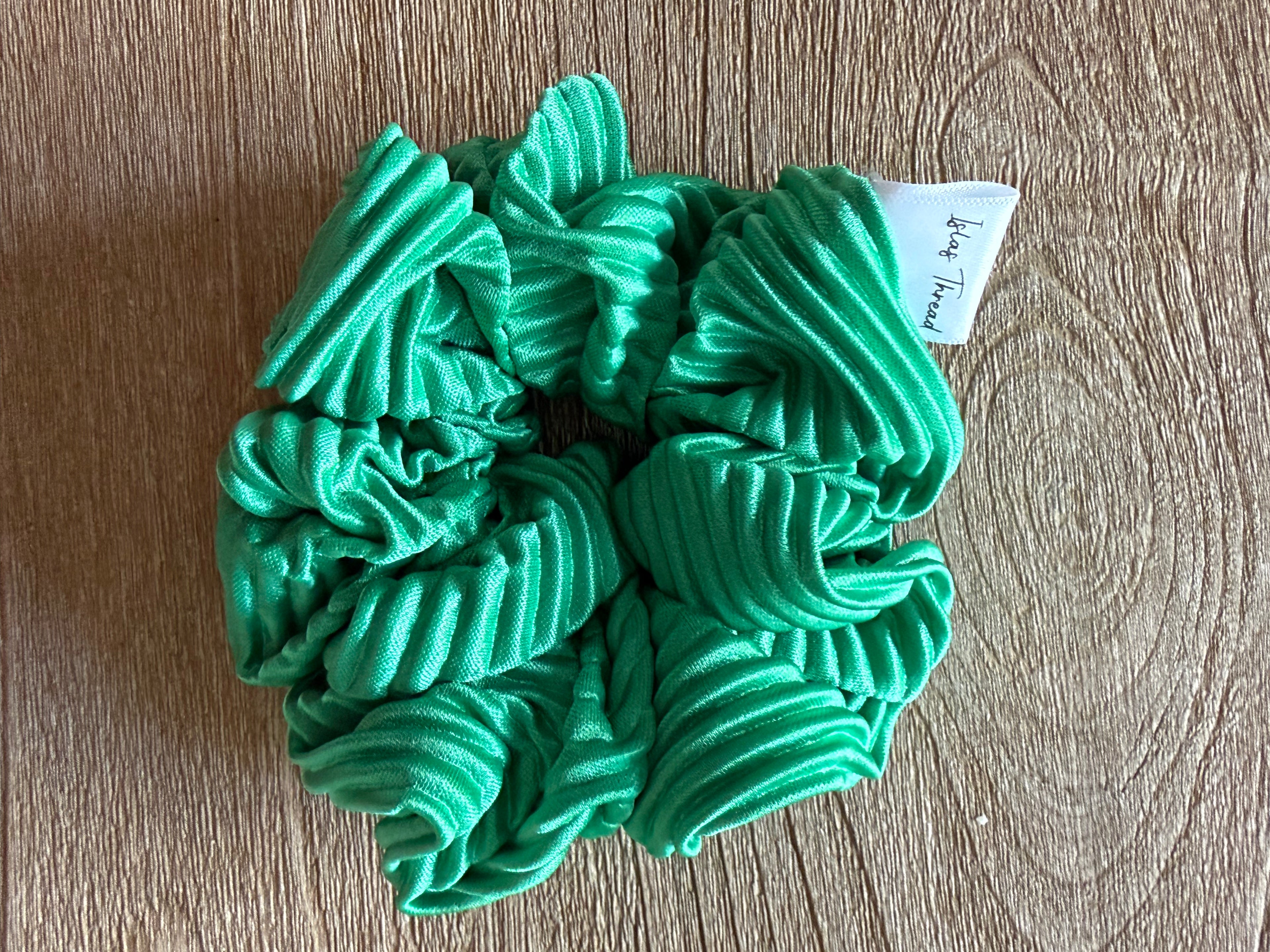 Green ribbed satin scrunchie